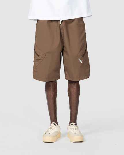 Man In The Street With Wide Leg Shorts