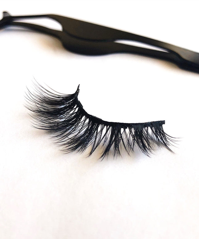 A Pair Of False Eyelashes With Magnets In Fashion